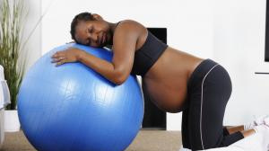 Pregnant woman on birthing ball