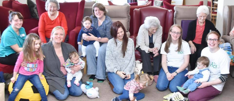Volunteers and mums at our Bridging the Generations Group