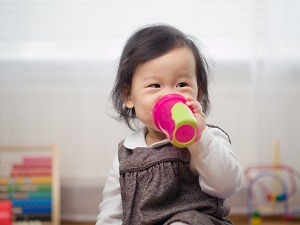Toddler with a cup