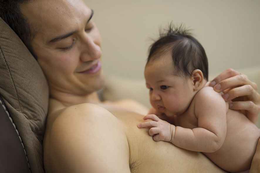 Dad having skin to skin with baby