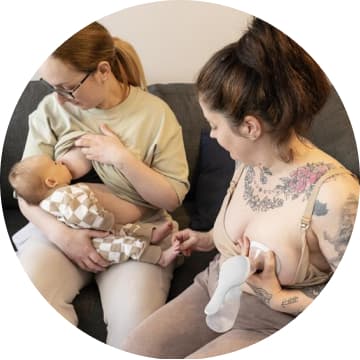 Two mums - one feeding, one expressing