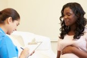 Woman and medical professional