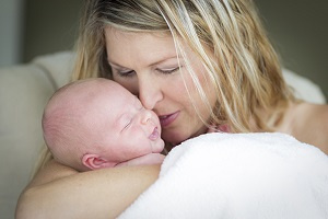 Woman with newborn baby