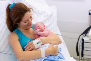 Woman and newborn baby