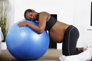 pregnant woman on yoga ball