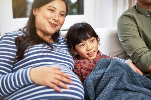 Pregnant mum with daughter