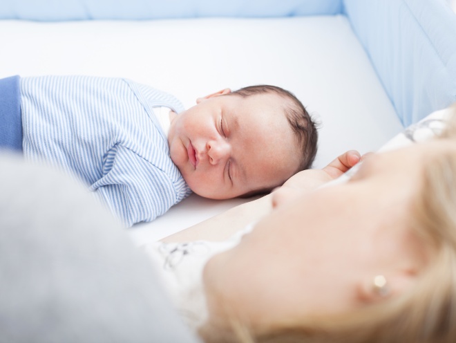 mum lying down with baby