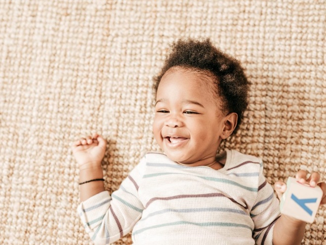 toddler lying down