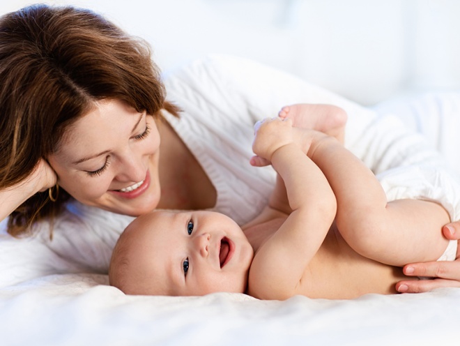 mum and baby lying down