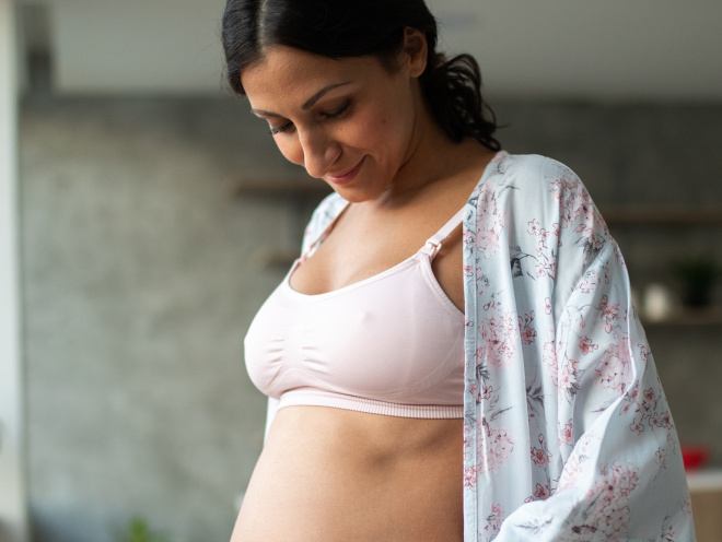 Woman wearing maternity bra