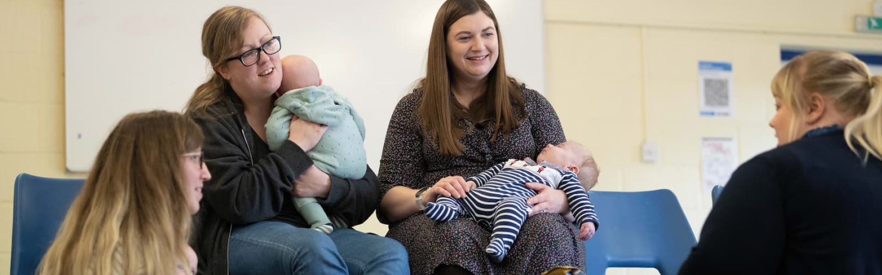 Mums at a postnatal meet-up