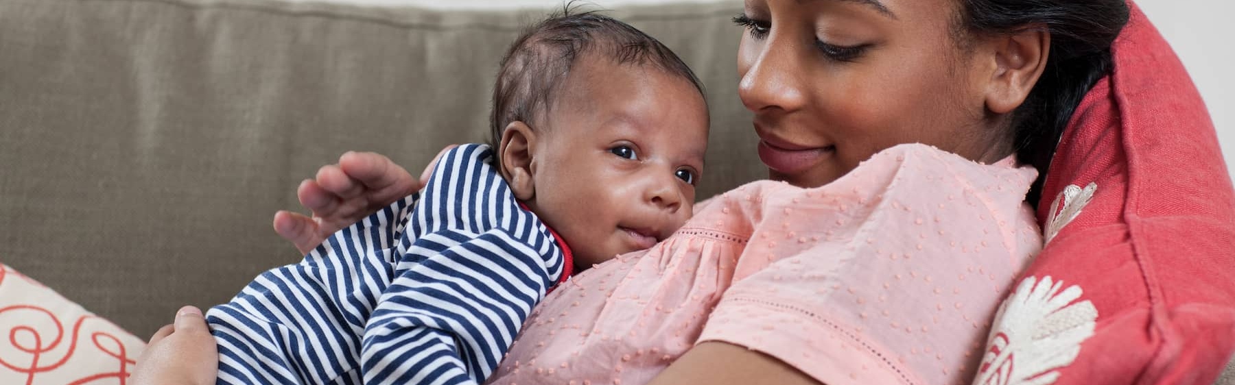 Mum with infant on couch