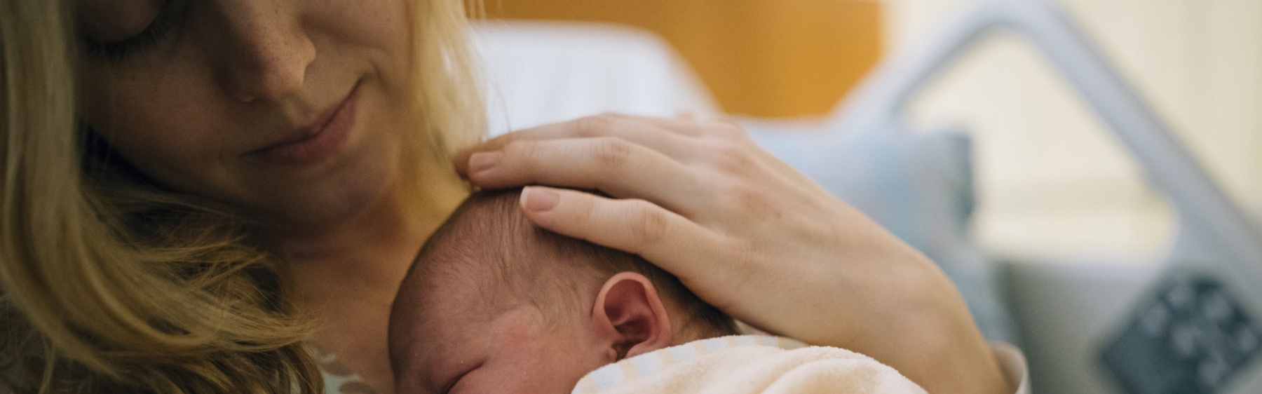 Parent with newborn baby