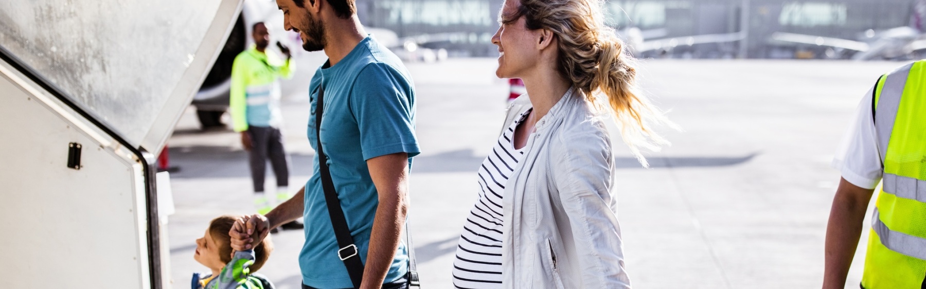 Family getting on a plane