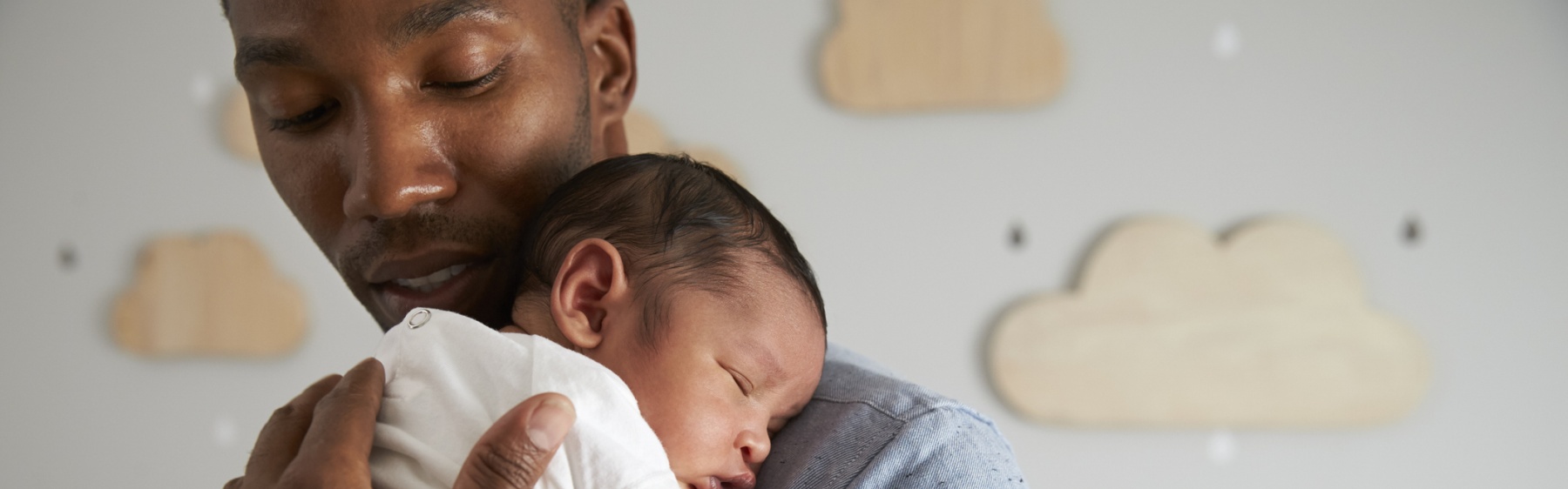 Parent holding newborn