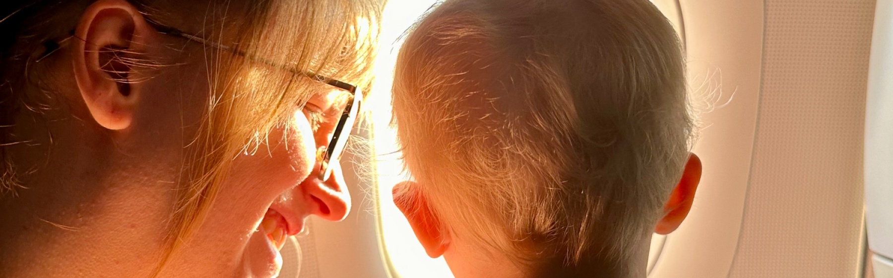Parent and baby on plane