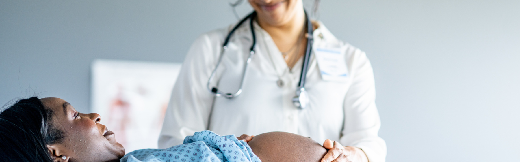 Doctor examining pregnant woman
