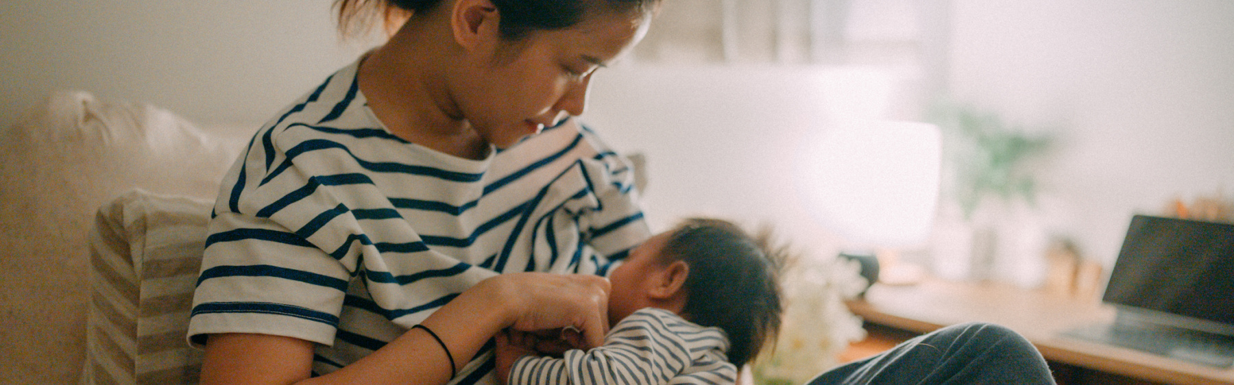 Mother breastfeeding baby