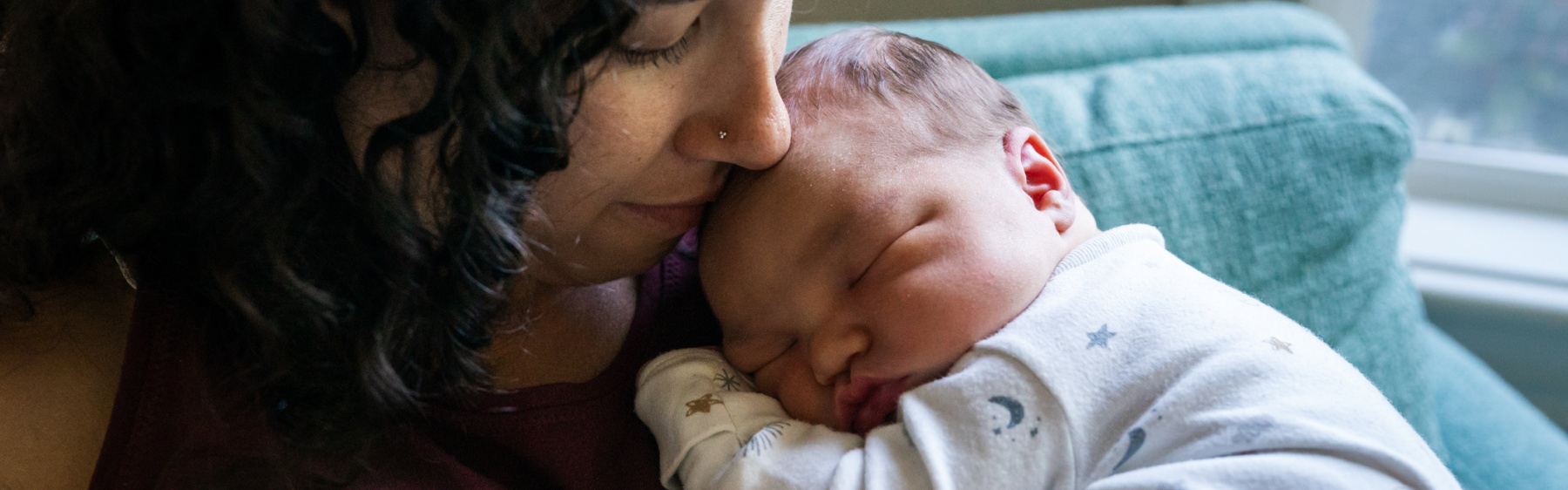 Mother holding newborn baby