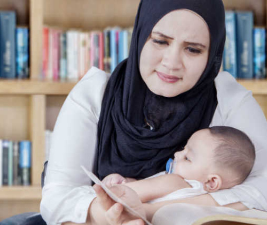 Parent studying with a baby