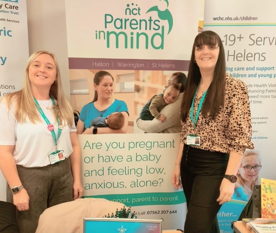 Volunteers at a NCT Parents in Mind promotional stand