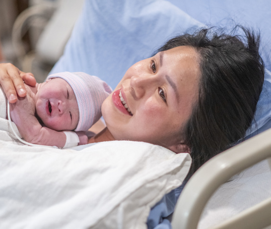 Mother or birthing parent after giving birth