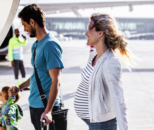 Family getting on a plane