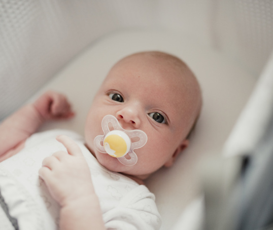 Baby with dummy