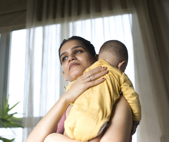 Parent holding baby