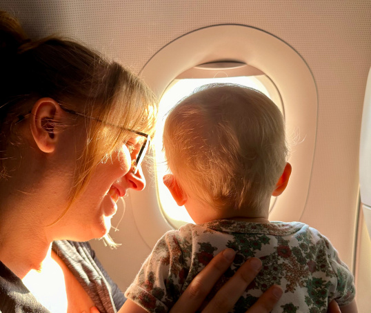 Parent and baby on plane