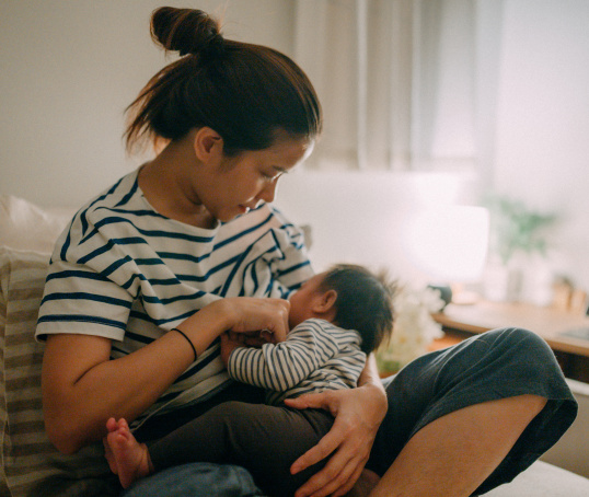 Mother breastfeeding baby