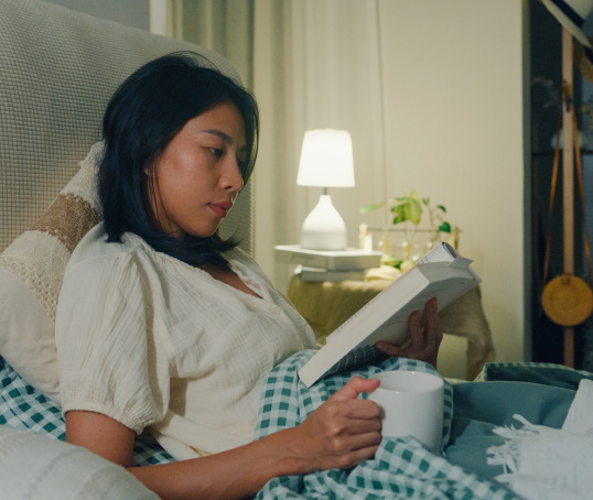 Reading a book in bed