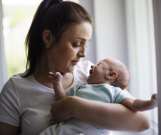 Mother or birthing person and baby