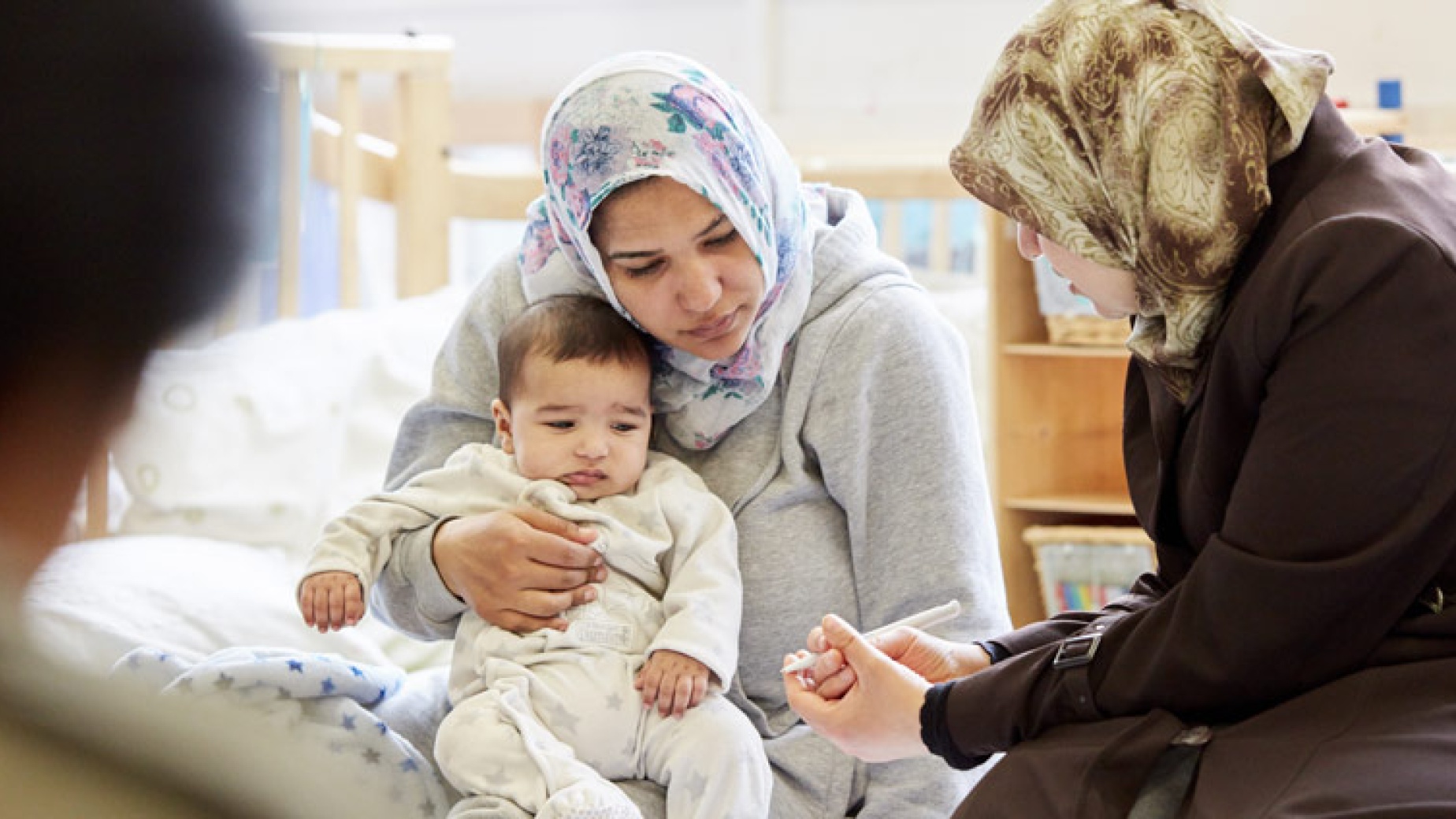 Breastfeeding Counsellor with a parent