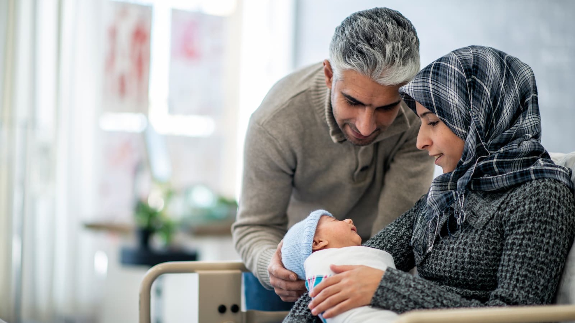 Parents with newborn baby
