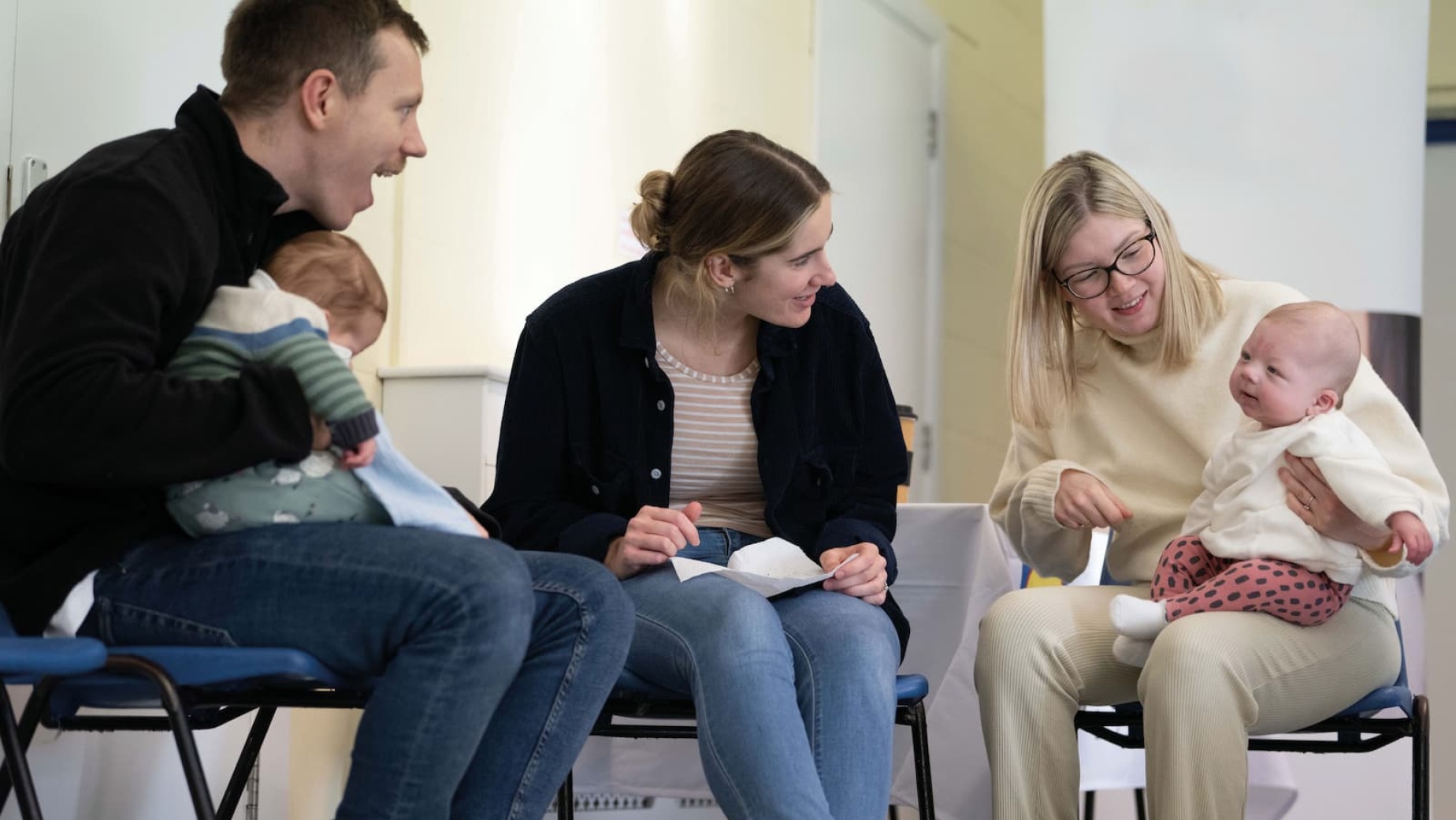 Parents with their babies at a postnatal group