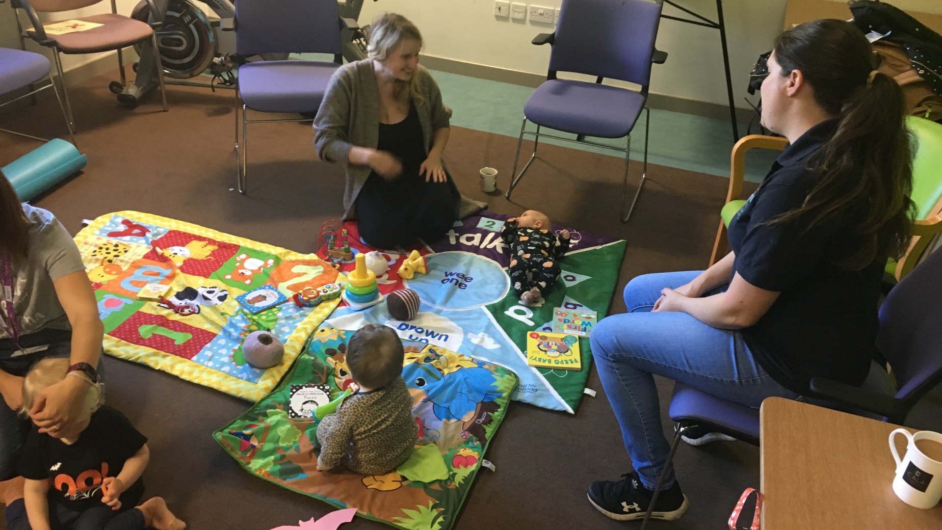Parents and children with a peer supporter