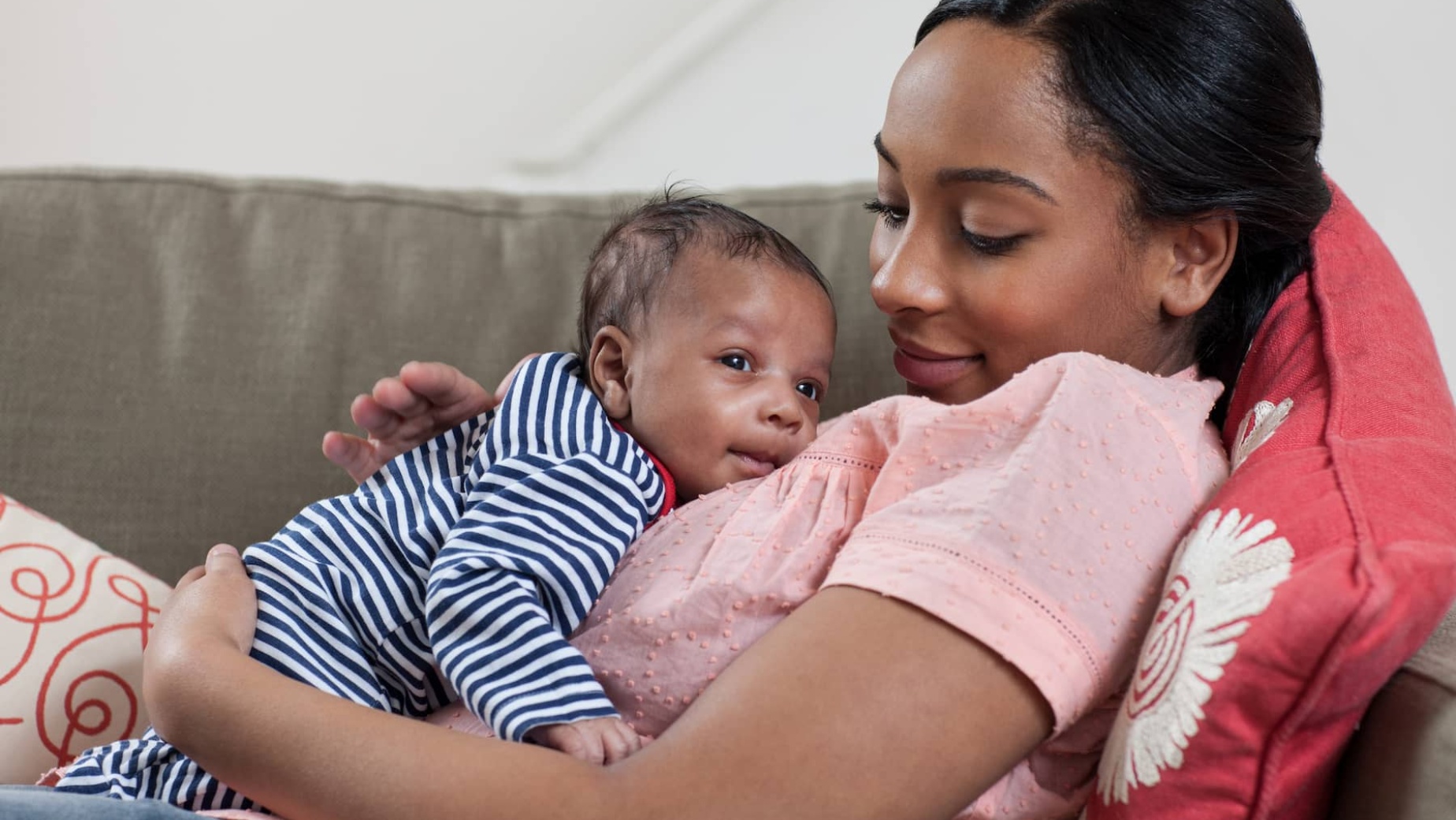Mum with infant on couch