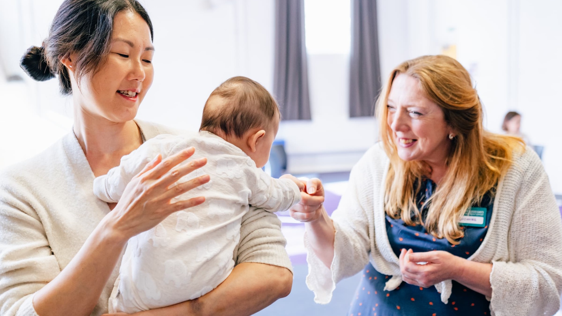 Course leader with mum and baby
