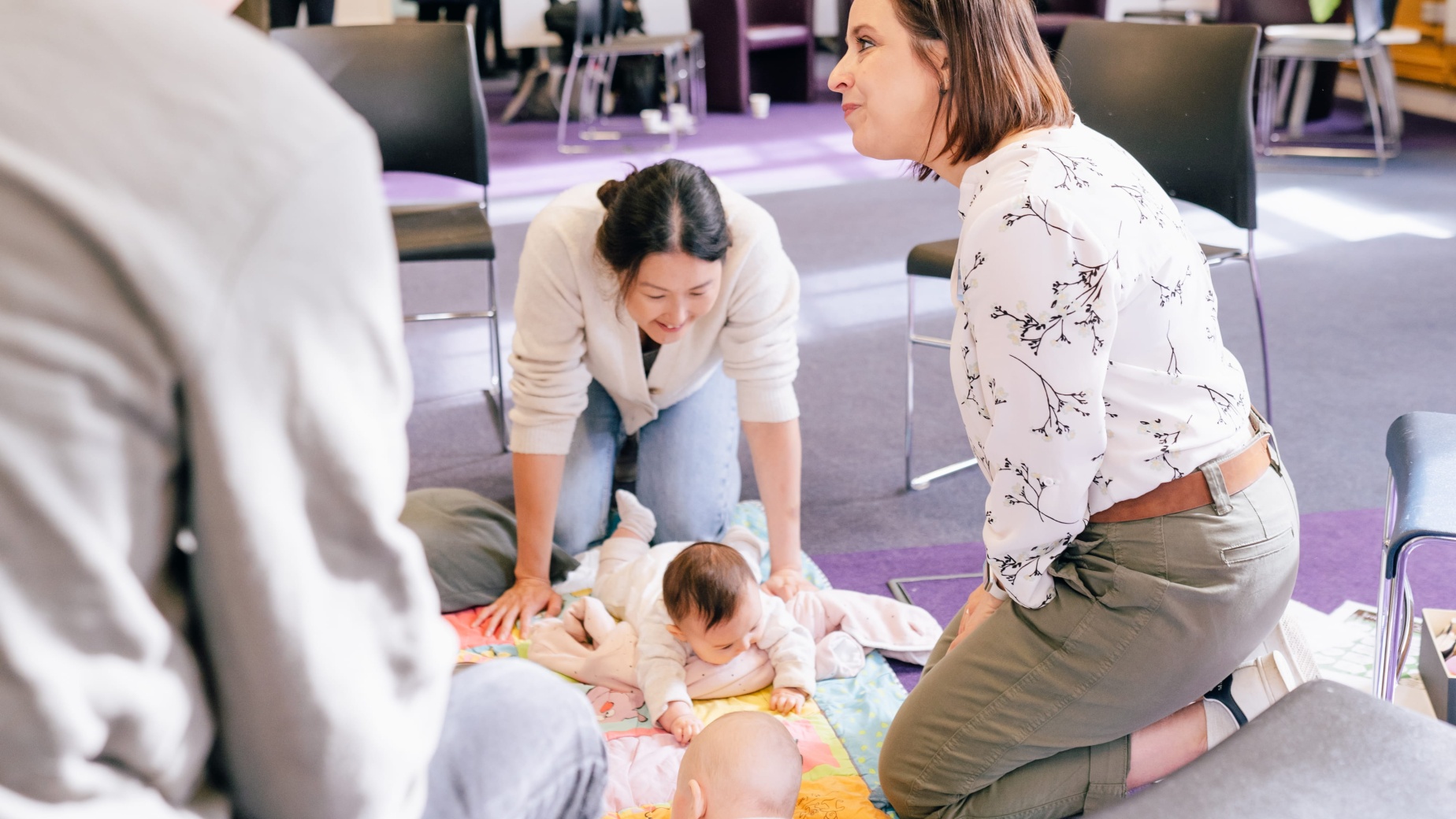 NCT New Baby postnatal course with practitioner, mum and babies