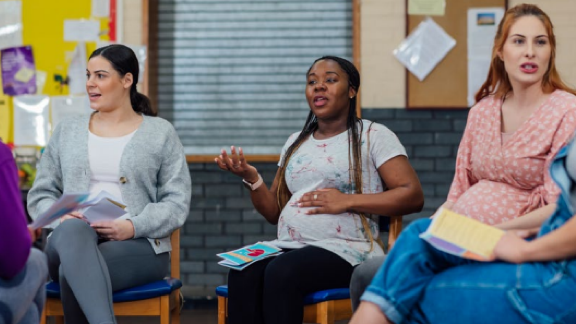Parents talking at antenatal group