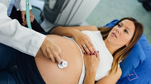 Pregnant lady with doctor