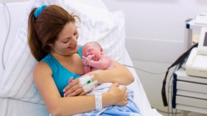 Woman and newborn baby