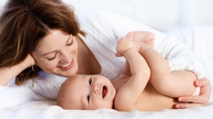 mum and baby lying down