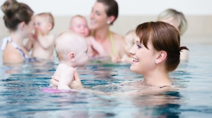 Mum with baby swimming