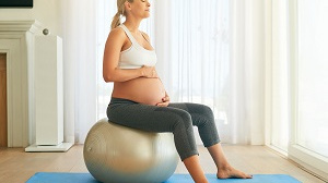 Pregnant woman on ball