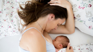 Mum breastfeeding newborn