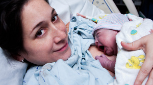 Woman and new born baby