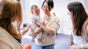 Mum with baby in a group