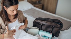 Parent packing a hospital bag